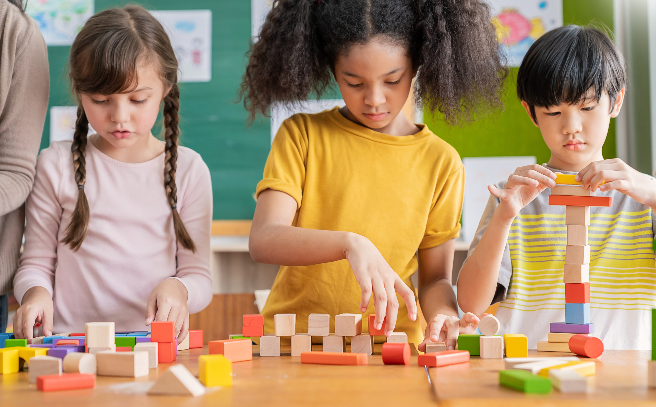 children-building-with-wooden-blocks-at-school-2026-01-05-04-57-58-utc Children building with wooden blocks